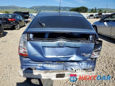 Zdjęcie 6 z 13 samochodu: 2005 TOYOTA PRIUS BASE VIN:JTDKB20UX57021065 - miniatura