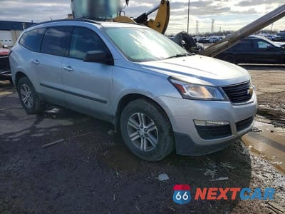 Czwarte zdjęcie samochodu z boku: 2017 CHEVROLET TRAVERSE VIN:1GNKRFKD7HJ329146 - miniatura