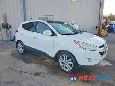 Czwarte zdjęcie samochodu z boku: 2013 HYUNDAI TUCSON LIMITED VIN:KM8JU3AC4DU616152 - miniatura