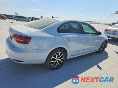 Trzecie zdjęcie samochodu z tyłu: 2017 VOLKSWAGEN JETTA SE VIN:3VWDB7AJ0HM412100 - miniatura