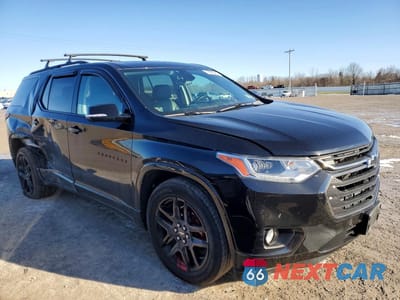 Czwarte zdjęcie samochodu z boku: 2020 CHEVROLET TRAVERSE PREMIER VIN:1GNEVKKWXLJ265552 - miniatura