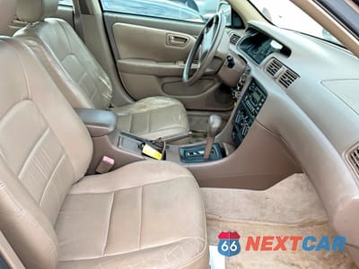 Piąte zdjęcie samochodu w środku: 1999 TOYOTA CAMRY VIN:4T1BF28K4XU081396 - miniatura