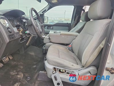 Zdjęcie 7 z 12 samochodu: 2014 FORD F150 XLT 4WD VIN:1FTFW1ET4EFC94850 - miniatura