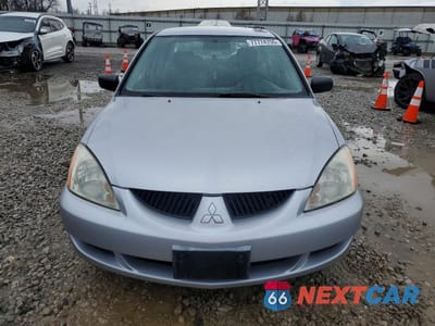 Piąte zdjęcie samochodu w środku: 2004 MITSUBISHI LANCER ES VIN:JA3AJ26E04U050880 - miniatura