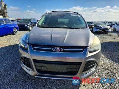 Piąte zdjęcie samochodu w środku: 2014 FORD ESCAPE TITANIUM VIN:1FMCU0J97EUE13530 - miniatura