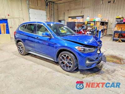 Czwarte zdjęcie samochodu z boku: 2021 BMW X1 XDRIVE28I VIN:WBXJG9C07M5T19035 - miniatura