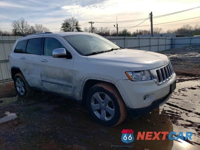Czwarte zdjęcie samochodu z boku: 2011 JEEP GRAND CHEROKEE LIMITED VIN:1J4RR5GG3BC745351 - miniatura