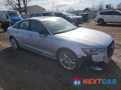 Czwarte zdjęcie samochodu z boku: 2012 AUDI A6 VIN:WAUGGAFC1CN138748 - miniatura