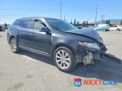 Czwarte zdjęcie samochodu z boku: 2016 LINCOLN MKT VIN:2LMHJ5FK4GBL00395 - miniatura