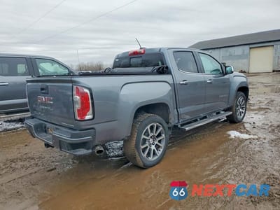 Trzecie zdjęcie samochodu z tyłu: 2022 GMC CANYON DENALI VIN:1GTG6EEN0N1226409 - miniatura