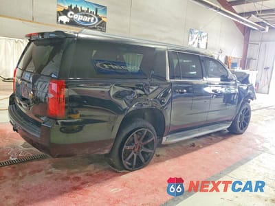 Trzecie zdjęcie samochodu z tyłu: 2015 CHEVROLET SUBURBAN K1500 LT VIN:1GNSKJKC9FR176332 - miniatura