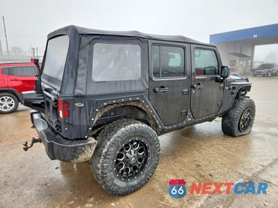Trzecie zdjęcie samochodu z tyłu: 2016 JEEP WRANGLER UNLIMITED SPORT VIN:1C4BJWDG9GL307711 - miniatura