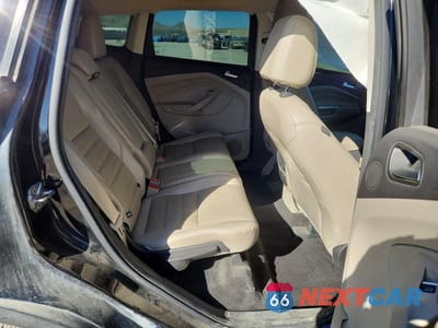 Zdjęcie 10 z 12 samochodu: 2017 FORD ESCAPE TITANIUM VIN:1FMCU9J98HUE47727 - miniatura