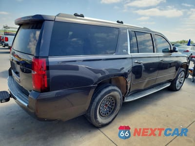 Trzecie zdjęcie samochodu z tyłu: 2015 CHEVROLET SUBURBAN K1500 LTZ VIN:1GNSKKKC5FR176785 - miniatura