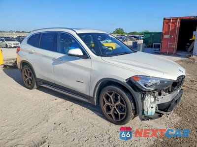 Czwarte zdjęcie samochodu z boku: 2016 BMW X1 XDRIVE28I VIN:WBXHT3C39G5F63889 - miniatura
