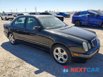 Czwarte zdjęcie samochodu z boku: 2002 MERCEDES-BENZ E 320 4MATIC VIN:WDBJF82J92X072086 - miniatura