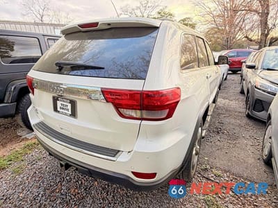 Czwarte zdjęcie samochodu z boku: 2012 JEEP GRAND CHEROKEE OVERLAND VIN:1C4RJFCG2CC132180 - miniatura