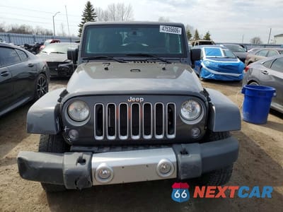 Piąte zdjęcie samochodu w środku: 2018 JEEP WRANGLER UNLIMITED SAHARA VIN:1C4BJWEG4JL900169 - miniatura