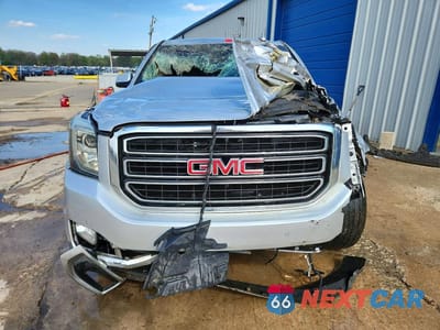 Piąte zdjęcie samochodu w środku: 2018 GMC YUKON SLT VIN:1GKS2BKCXJR302466 - miniatura