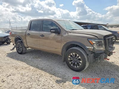 Czwarte zdjęcie samochodu z boku: 2021 NISSAN TITAN PRO-4X VIN:1N6AA1ED9MN515961 - miniatura