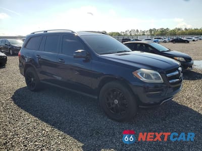 Czwarte zdjęcie samochodu z boku: 2014 MERCEDES-BENZ GL 450 4MATIC VIN:4JGDF7CE0EA303132 - miniatura