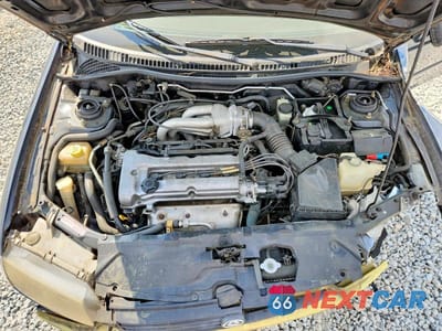 Zdjęcie 11 z 12 samochodu: 1996 MAZDA PROTEGE DX VIN:JM1BB1415T0327980 - miniatura