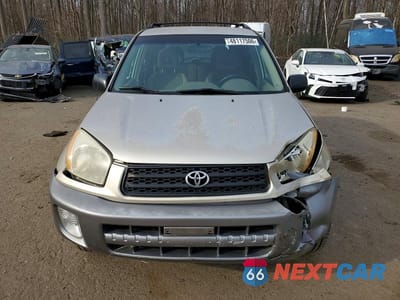 Piąte zdjęcie samochodu w środku: 2003 TOYOTA RAV4 BASE VIN:JTEHH20V936092659 - miniatura