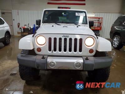 Piąte zdjęcie samochodu w środku: 2013 JEEP WRANGLER UNLIMITED SAHARA VIN:1C4BJWEG3DL539148 - miniatura