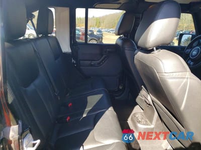 Zdjęcie 10 z 13 samochodu: 2015 JEEP WRANGLER UNLIMITED SAHARA VIN:1C4BJWEGXFL663789 - miniatura