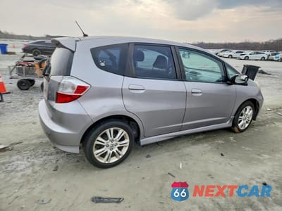 Trzecie zdjęcie samochodu z tyłu: 2010 HONDA FIT SPORT VIN:JHMGE8H44AS001985 - miniatura