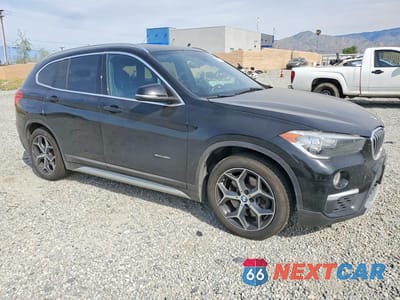 Czwarte zdjęcie samochodu z boku: 2018 BMW X1 XDRIVE28I VIN:WBXHT3C3XJ5L24548 - miniatura