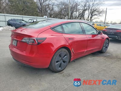 Trzecie zdjęcie samochodu z tyłu: 2021 TESLA MODEL 3 VIN:5YJ3E1EA0MF850885 - miniatura