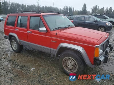 Czwarte zdjęcie samochodu z boku: 1995 JEEP CHEROKEE COUNTRY VIN:1J4FJ78SXSL609078 - miniatura