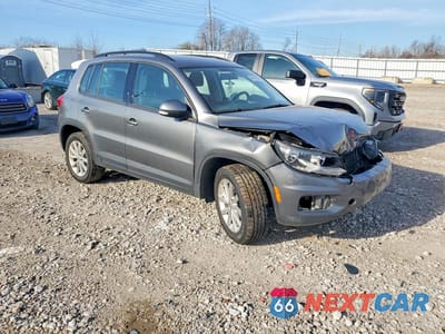 Czwarte zdjęcie samochodu z boku: 2017 VOLKSWAGEN TIGUAN S VIN:WVGBV7AX0HK051721 - miniatura
