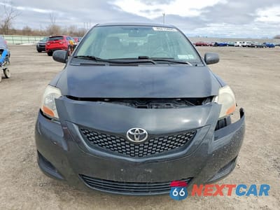 Piąte zdjęcie samochodu w środku: 2010 TOYOTA YARIS BASE VIN:JTDBT4K38A4069396 - miniatura