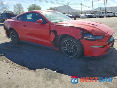 Czwarte zdjęcie samochodu z boku: 2021 FORD MUSTANG I4 COUPE VIN:1FA6P8TH3M5104874 - miniatura