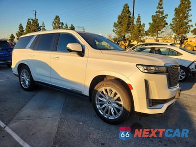Czwarte zdjęcie samochodu z boku: 2022 CADILLAC ESCALADE PREMIUM LUXURY VIN:1GYS4CKL1NR206527 - miniatura