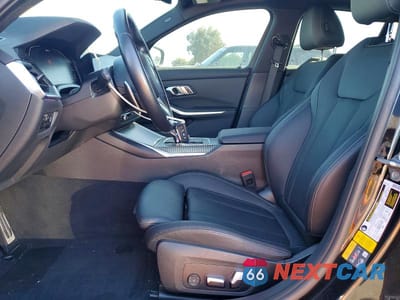 Zdjęcie 7 z 11 samochodu: 2022 BMW 330E VIN:3MW5P7J01N8C61849 - miniatura