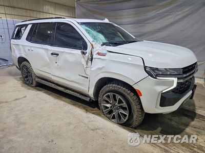 Czwarte zdjęcie samochodu z boku: 2022 CHEVROLET TAHOE K1500 Z71 VIN:1GNSKPKD1NR102073 - miniatura
