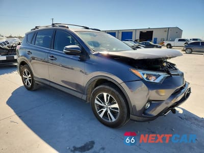 Czwarte zdjęcie samochodu z boku: 2017 TOYOTA RAV4 XLE VIN:JTMWFREV2HJ719015 - miniatura