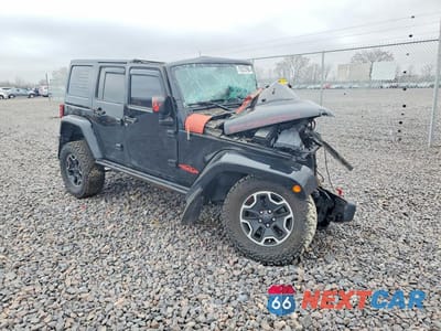 Czwarte zdjęcie samochodu z boku: 2016 JEEP WRANGLER UNLIMITED RUBICON VIN:1C4HJWFG1GL208484 - miniatura