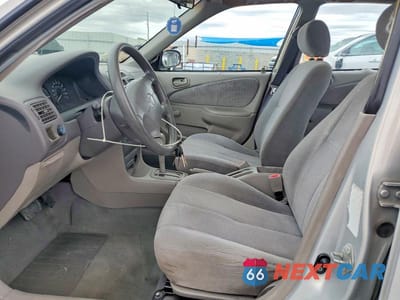 Zdjęcie 7 z 12 samochodu: 2002 TOYOTA COROLLA CE VIN:1NXBR12E22Z610003 - miniatura