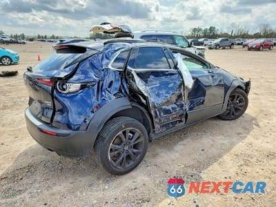 Trzecie zdjęcie samochodu z tyłu: 2025 MAZDA CX-30 PREMIUM PLUS VIN:3MVDMBEY4SM784665 - miniatura