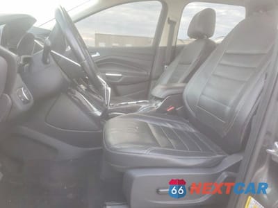 Zdjęcie 7 z 13 samochodu: 2016 FORD ESCAPE TITANIUM VIN:1FMCU9JX5GUB54669 - miniatura