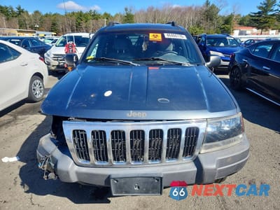 Piąte zdjęcie samochodu w środku: 2001 JEEP GRAND CHEROKEE LAREDO VIN:1J4GW48S11C700338 - miniatura