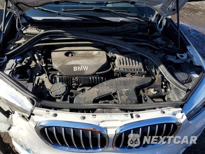 Zdjęcie 12 z 13 samochodu: 2018 BMW X1 XDRIVE28I VIN:WBXHT3C37J5K30028 - miniatura