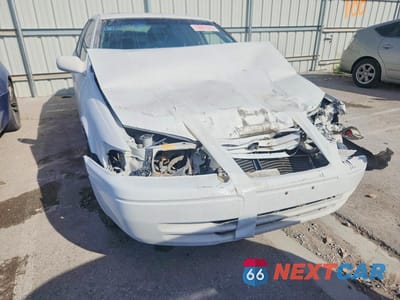 Piąte zdjęcie samochodu w środku: 1997 TOYOTA CAMRY CE VIN:4T1BF22K4VU036819 - miniatura