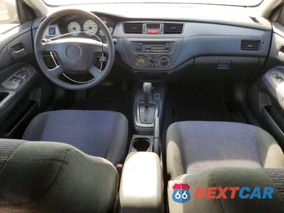 Zdjęcie 8 z 12 samochodu: 2002 MITSUBISHI LANCER OZ RALLY VIN:JA3AJ86E52U066279 - miniatura