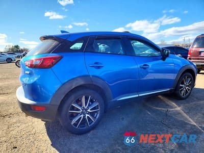 Trzecie zdjęcie samochodu z tyłu: 2017 MAZDA CX-3 GRAND TOURING VIN:JM1DKFD77H0164654 - miniatura
