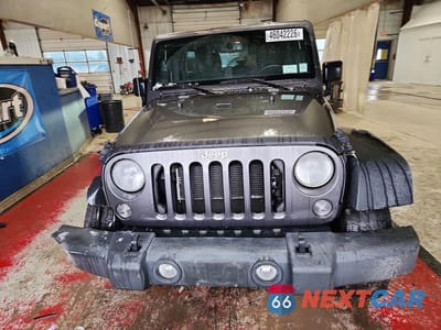 Piąte zdjęcie samochodu w środku: 2016 JEEP WRANGLER UNLIMITED SPORT VIN:1C4BJWDGXGL219475 - miniatura